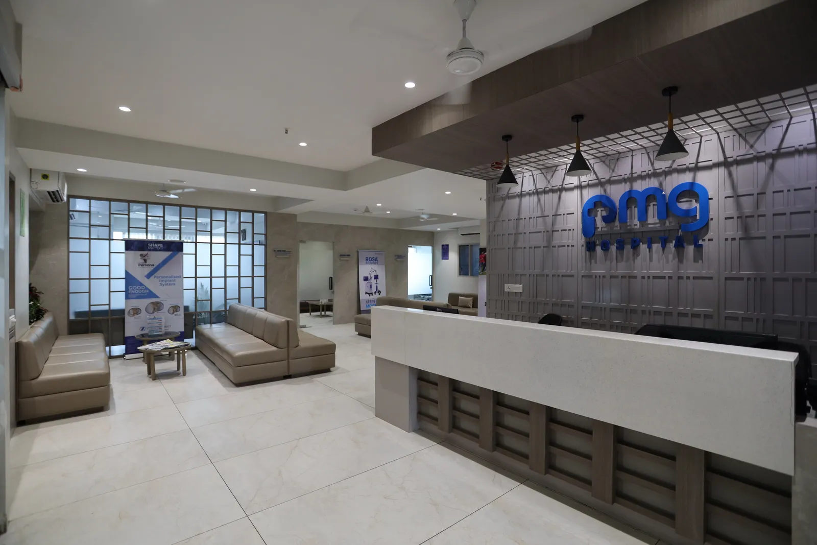 Reception and patient waiting area at PMG Orthopedic Hospital, Gota, Ahmedabad